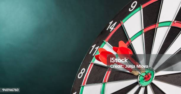 Two Darts In The Center Of The Target Dartboard Stock Photo - Download Image Now - Darts, Dart, Bull's-Eye