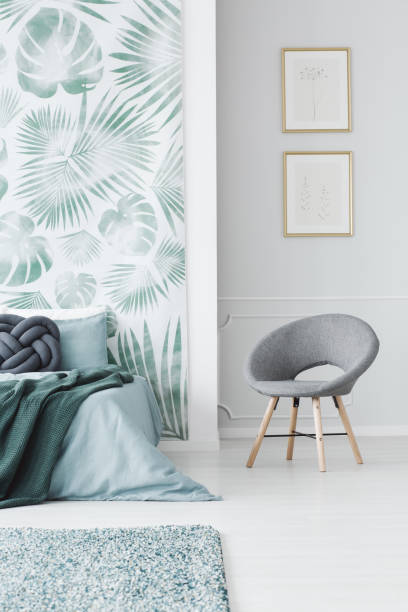 istock Modern upholstered chair in bedroom 940147666