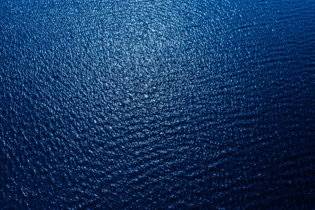 istock aerial view to blue water in river. blue background or texture 940147676