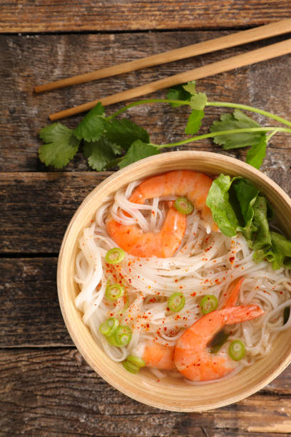 istock chinese soup with noodles and shrimp 940148364