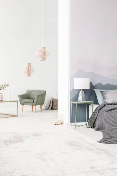 istock Pink lantern pendants and armchair 940153144