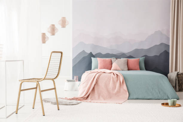 istock Gold chair in bright bedroom 940153146