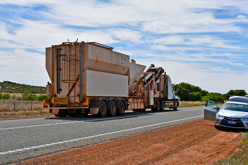 Greenough, WA, Australia - November 24, 2017: Oversice transport on truck on Brand highway in Western Australia