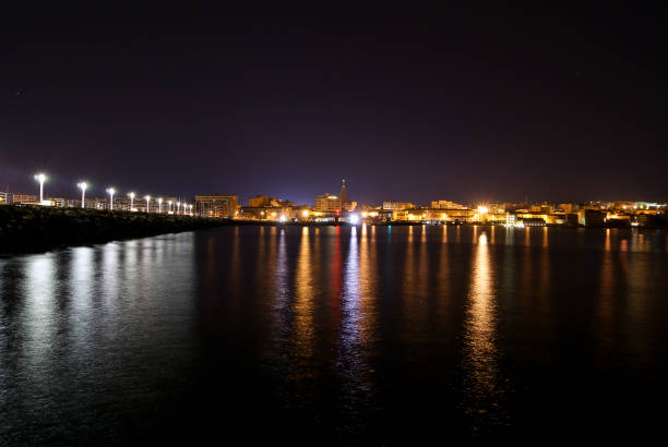 istock Ortygia Island's Coast by Night in Syracuse 940153620