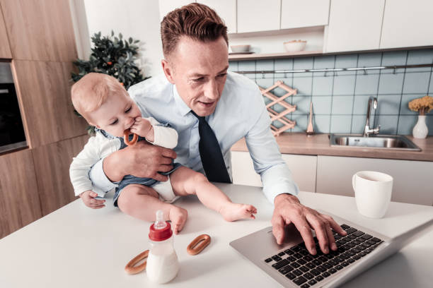 istock Concentrated man working with his laptop 940156172