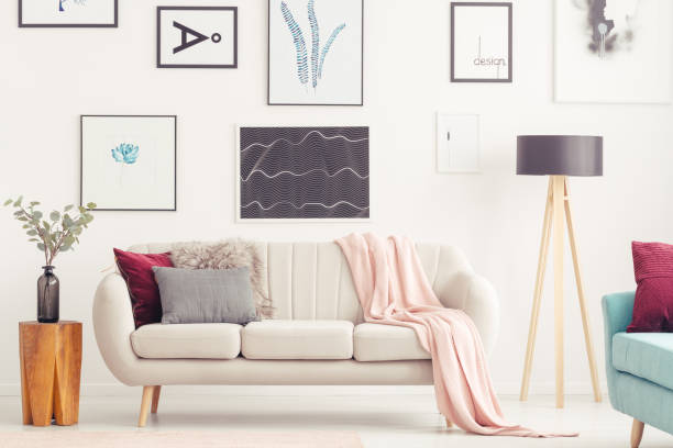 istock Posters in pastel living room 940157736