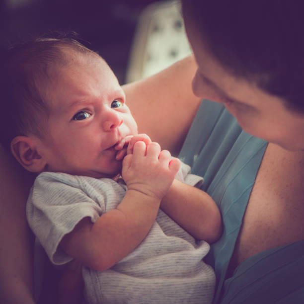 istock Mother with her newborn baby 940159310