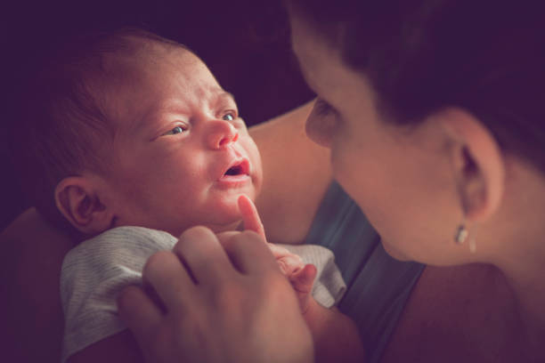 istock Mother with her newborn baby 940159382