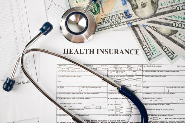 Health care costs Health care costs. Stethoscope and calculator symbol for health care costs or medical insurance claim form stock pictures, royalty-free photos & images