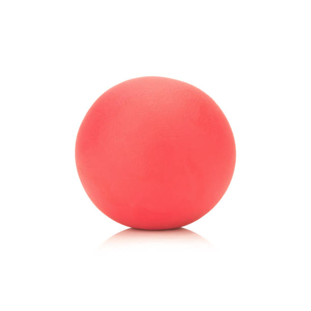 istock plasticine clay single red ball on white background closeup 940171562