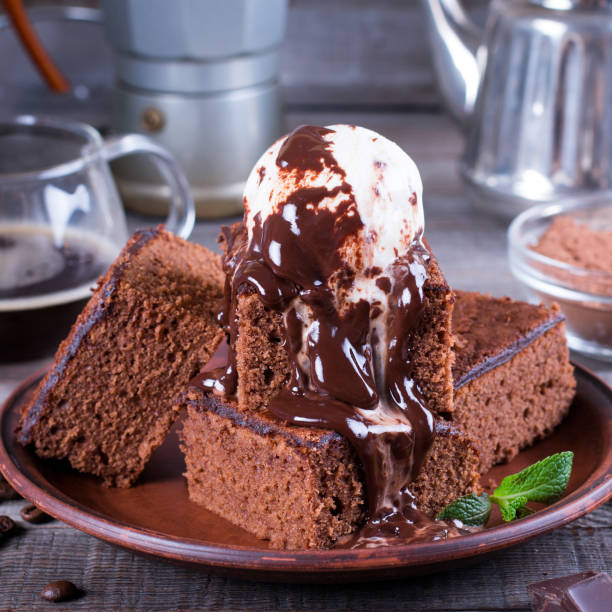 istock Chocolate cake with ice cream and chocolate sauce 940182048