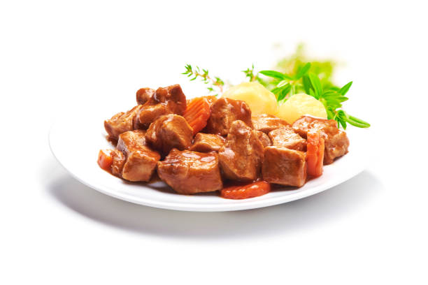 istock Goulash, beef stew with potatoes, isolated on white background 940183182