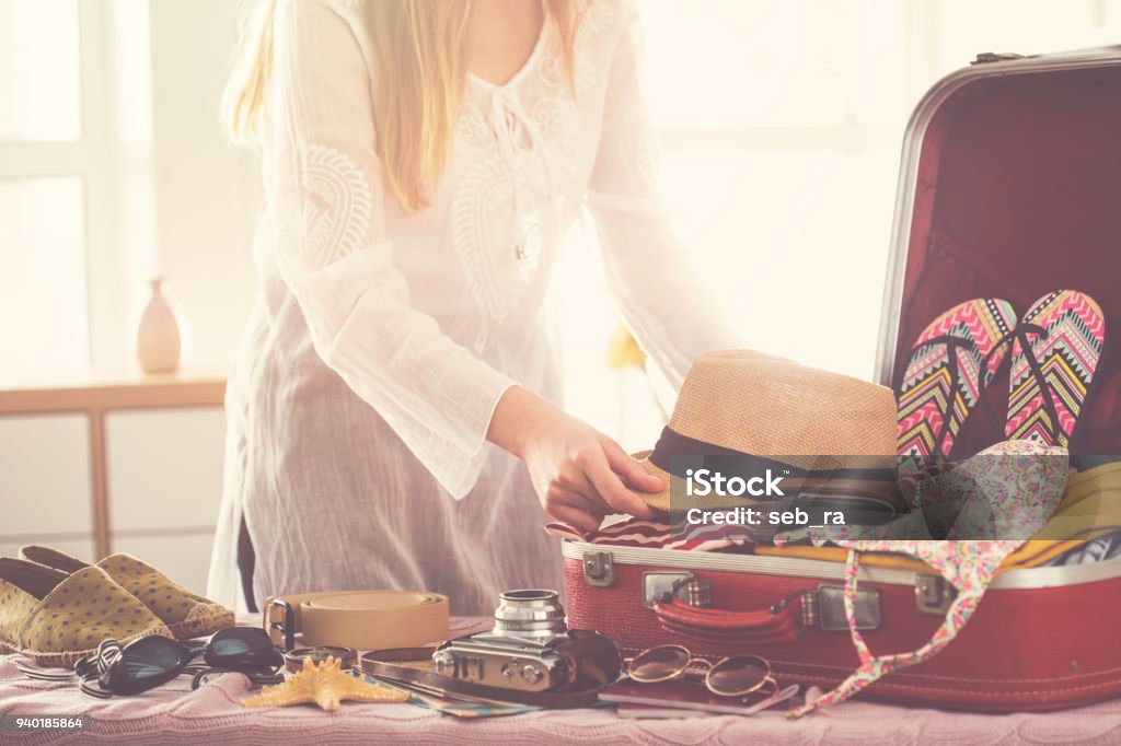 Travel suitcase prepareing concept Suitcase Stock Photo