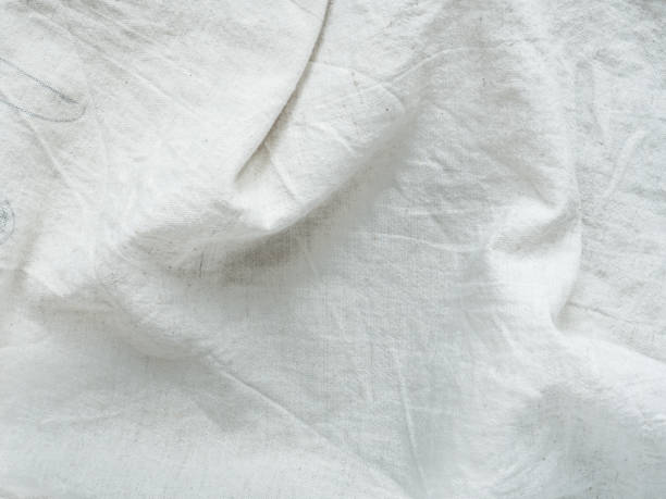 istock Crumpled texture linen Fabric background vintage 940186028