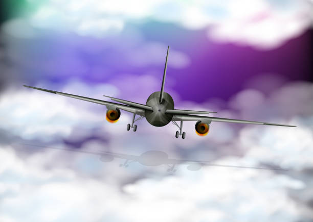 istock Back of airplane flying in purple sky 940188926
