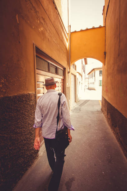 istock Walking on alley in old town 940188934