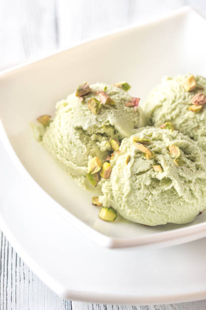 istock Pistachio ice cream in the bowl 940189246