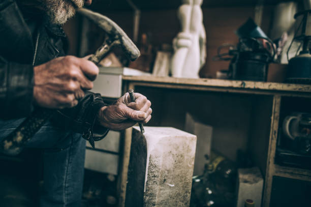 istock Senior sculptor artist 940193694
