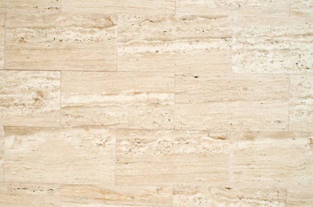 istock New brown decorative stone tiles on wall closeup 940193904