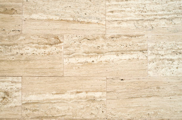 istock New brown decorative stone tiles on wall closeup 940193962