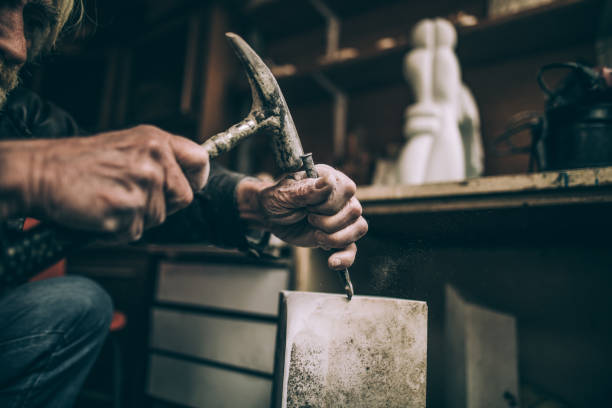 istock Senior sculptor artist 940194008