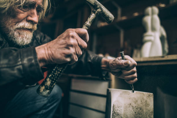 istock Senior sculptor artist 940194044