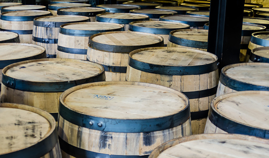 Bourbon barrels lined up and ready for storage