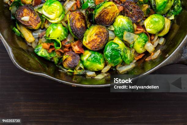 Wide Half View Of Roasted Brussels Sprouts And Bacon Stock Photo - Download Image Now