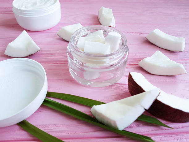 istock Cosmetic coconut cream on a pink wooden 940203854