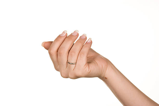 Young Woman Holding A Diamond Ring At Sunset