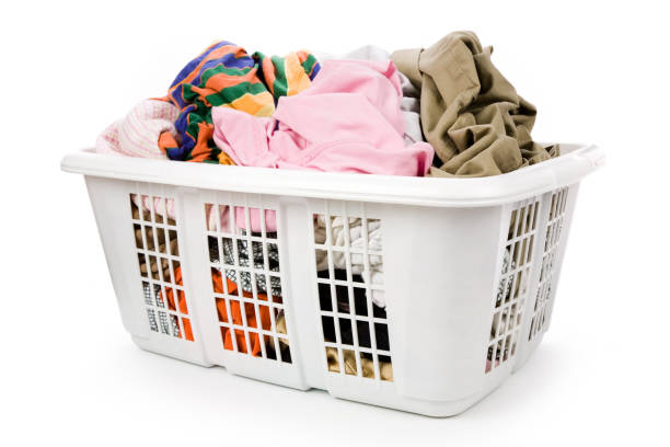istock laundry basket and dirty clothing 940218068