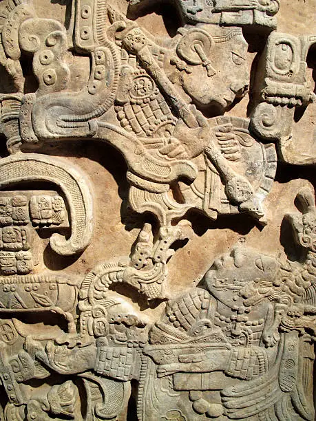 Ancient Maya limestone lintel from Yachilan, Mexico dating from about AD725. The scene is of a blood-letting ritual.