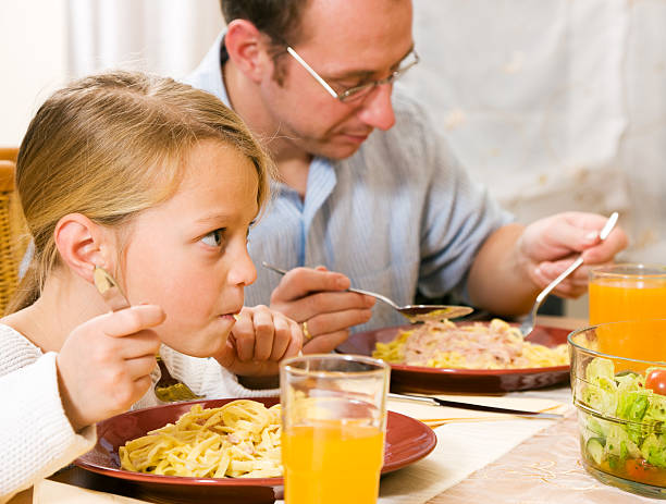 istock Girl and man having a meal together 94022388