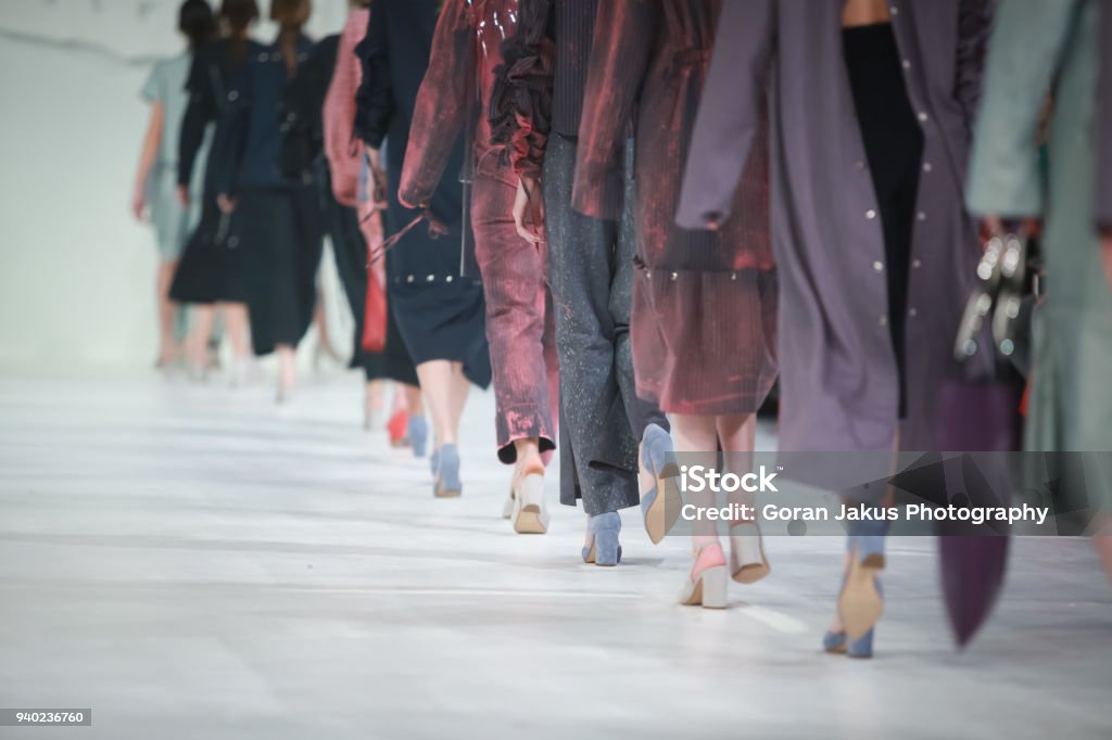 Catwalk Runway Show Event Fashion Show, Catwalk Runway Show Event. Detail of lined up rear view, fashion models. Fashion Show Stock Photo