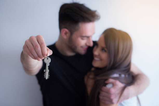 istock the young couple is moving into a new apartment 940240424