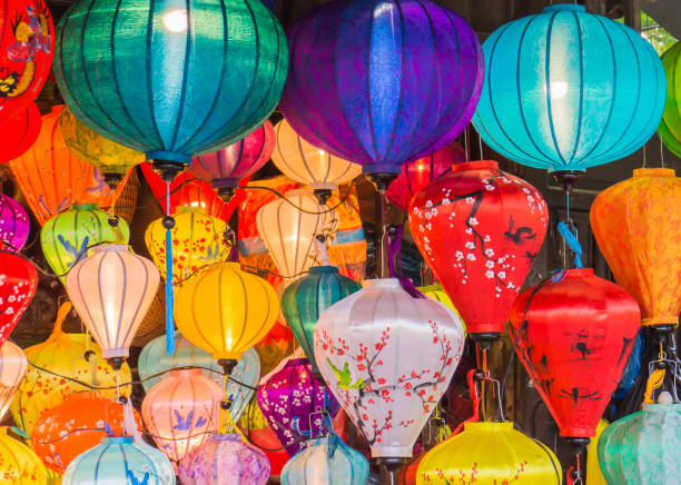 istock many colors of silk lanterns lit up at night 940240764