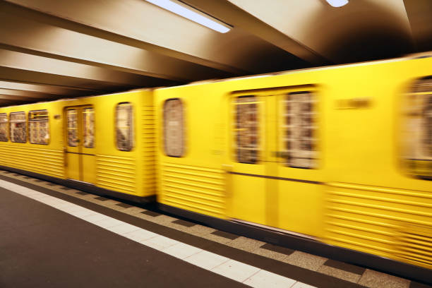 istock Close up yellow metro underground train in motion 940247704