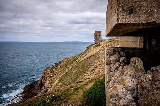 WWII German Naval Tower MP3, Battery Moltke, viewed from bunker, St Ouen, Jersey, Channel Islands. Guernsey Sark and Herm visible on the horizon.