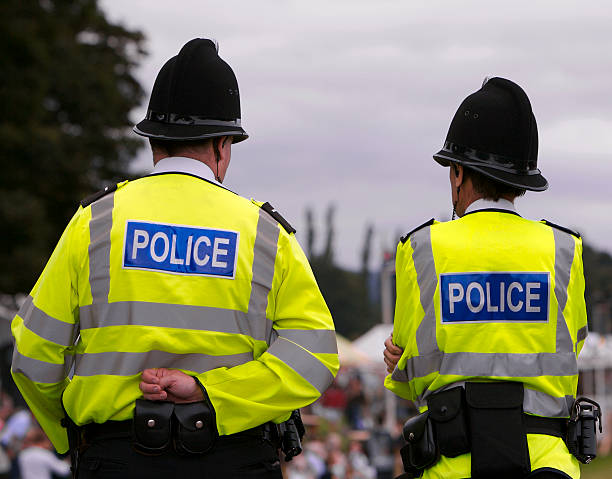 o policiamento do verão fair showground - uk - fotografias e filmes do acervo