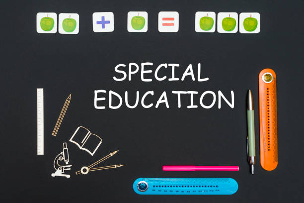 istock Above stationery supplies and text special education on black background 940255732