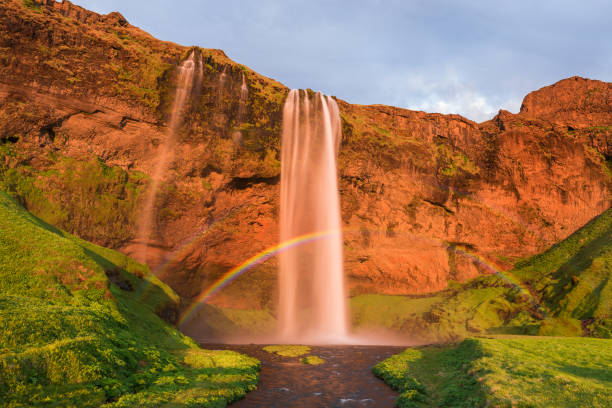 istock Seljalandsfoss waterfall with a rainbow in Iceland 940259354