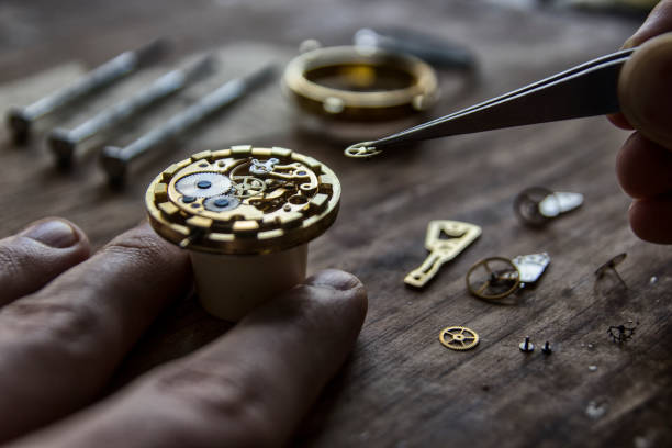 istock Process of installing a part on a mechanical watch, watch repair 940260130