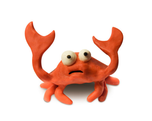 istock clay crab raised claws isolated with clipping path 940261186