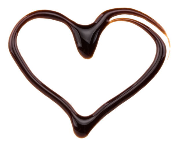 istock Heart made from chocolate syrup, isolated on white 940264748