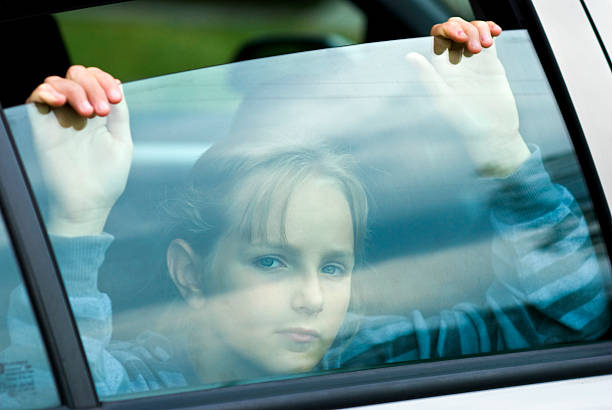 istock Sad girl in car 94026720
