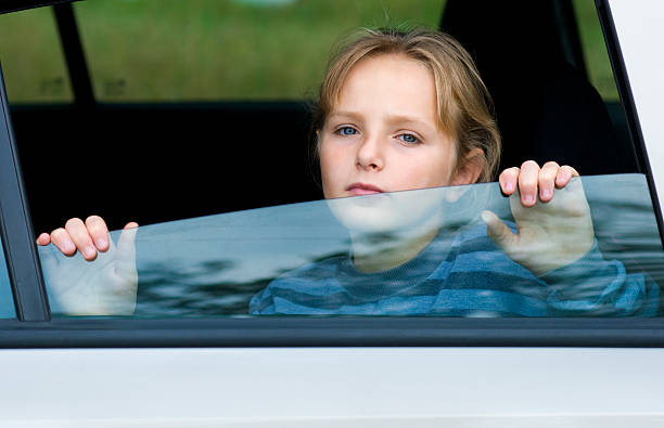 istock Sad girl in car 94026740