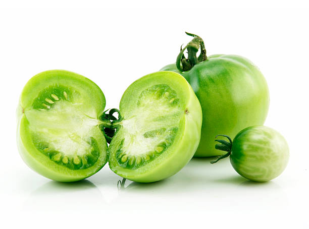 istock Ripe Green Sliced Tomatoes Isolated on White 94026829