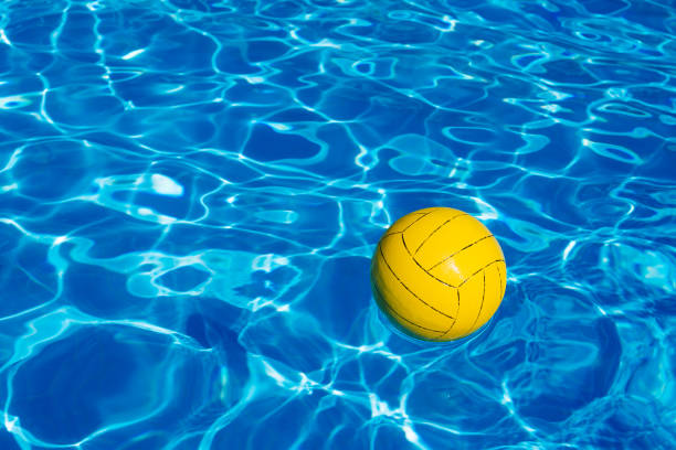 istock Yellow ball in the pool 940271398