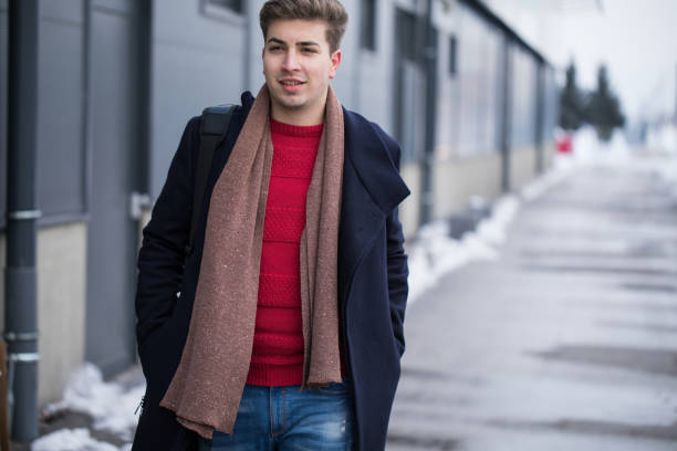 istock Businessman walking on the street 940284498