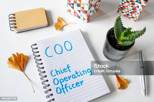 Coo Chief Operating Officer Written In A Notebook Stock Photo - Download Image Now - COO, Bonding, Business
